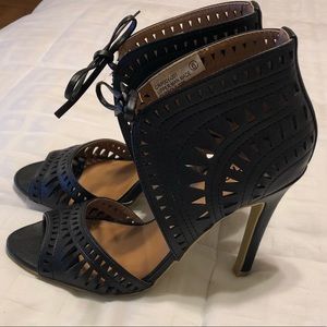 Black faux leather heels